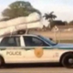 Illustration for article titled Florida Cop Transports Mattress, Box Spring With Squad Car